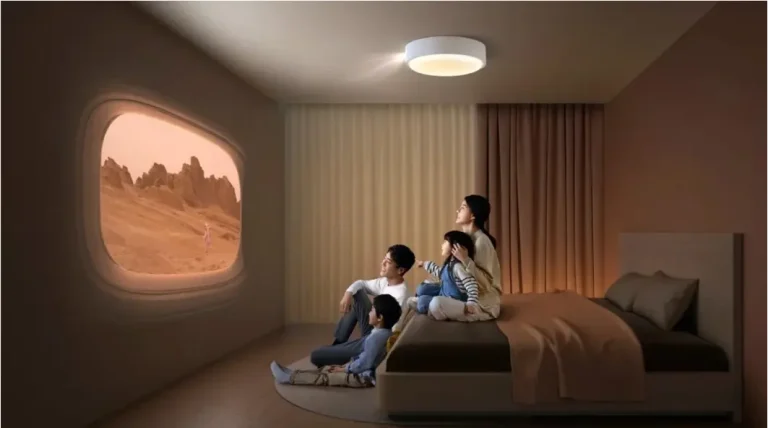Young user enjoying home cinema with XGIMI projector in a minimalist bedroom