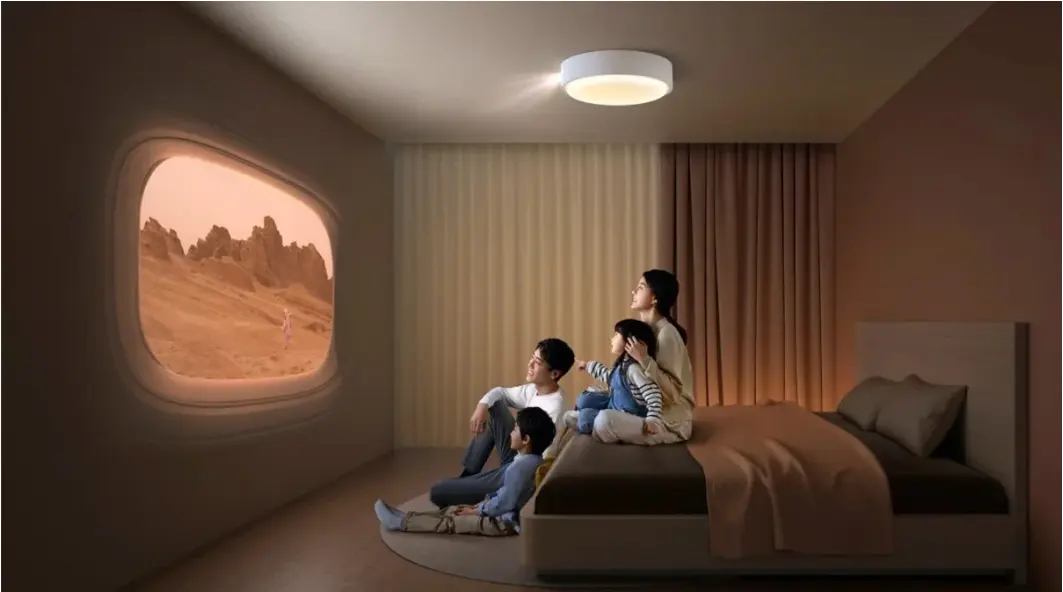 Young user enjoying home cinema with XGIMI projector in a minimalist bedroom
